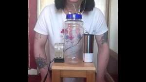 bisexual crossdresser with his portable cow milking machine part 1