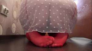 The camera watches from the side, as a busty milf fucks with a dildo and records a video. Gorgeous big tits.