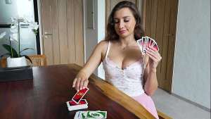 Get on your knees and suck my huge cock because you lost at UNO cards