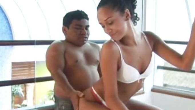 Frizzy Hair Brunette Dances For A Midget