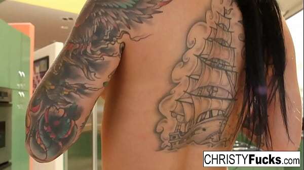 Hot Christy Mack plays with her amazing tits and wet pussy on the kitchen counter