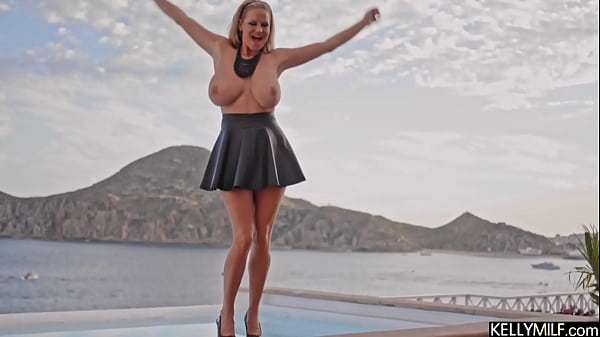 My tits crave even more sun, that’s why I’m playing poolside naked – Kelly Madison