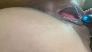 Sexy brunette has fun with her vibrator in her pussy