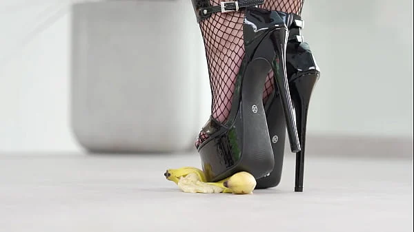 Petite girl crushes fruits with high heels! Hot footfetish!