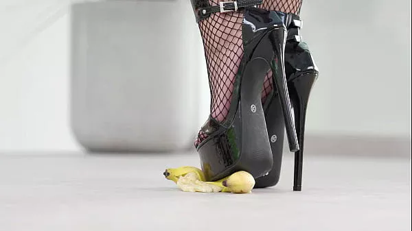 Petite girl crushes fruits with high heels! Hot footfetish!
