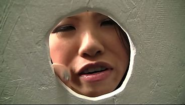 Asian slut gets tricked at the gloryhole to sucking a big white cock